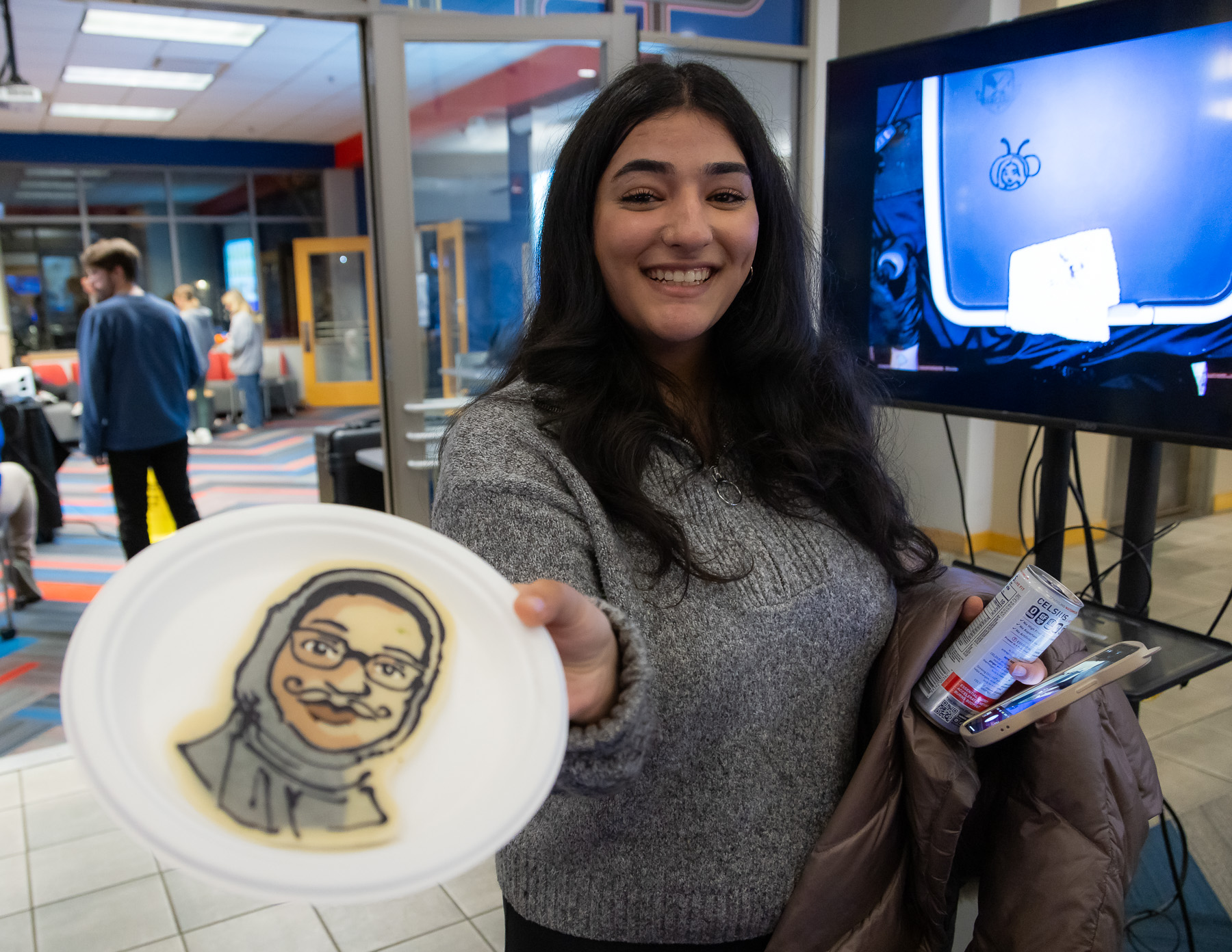 Students lined up to have custom bespoke pancakes made in any design they wanted. (Photo by Jeff Carrion / DePaul University) 